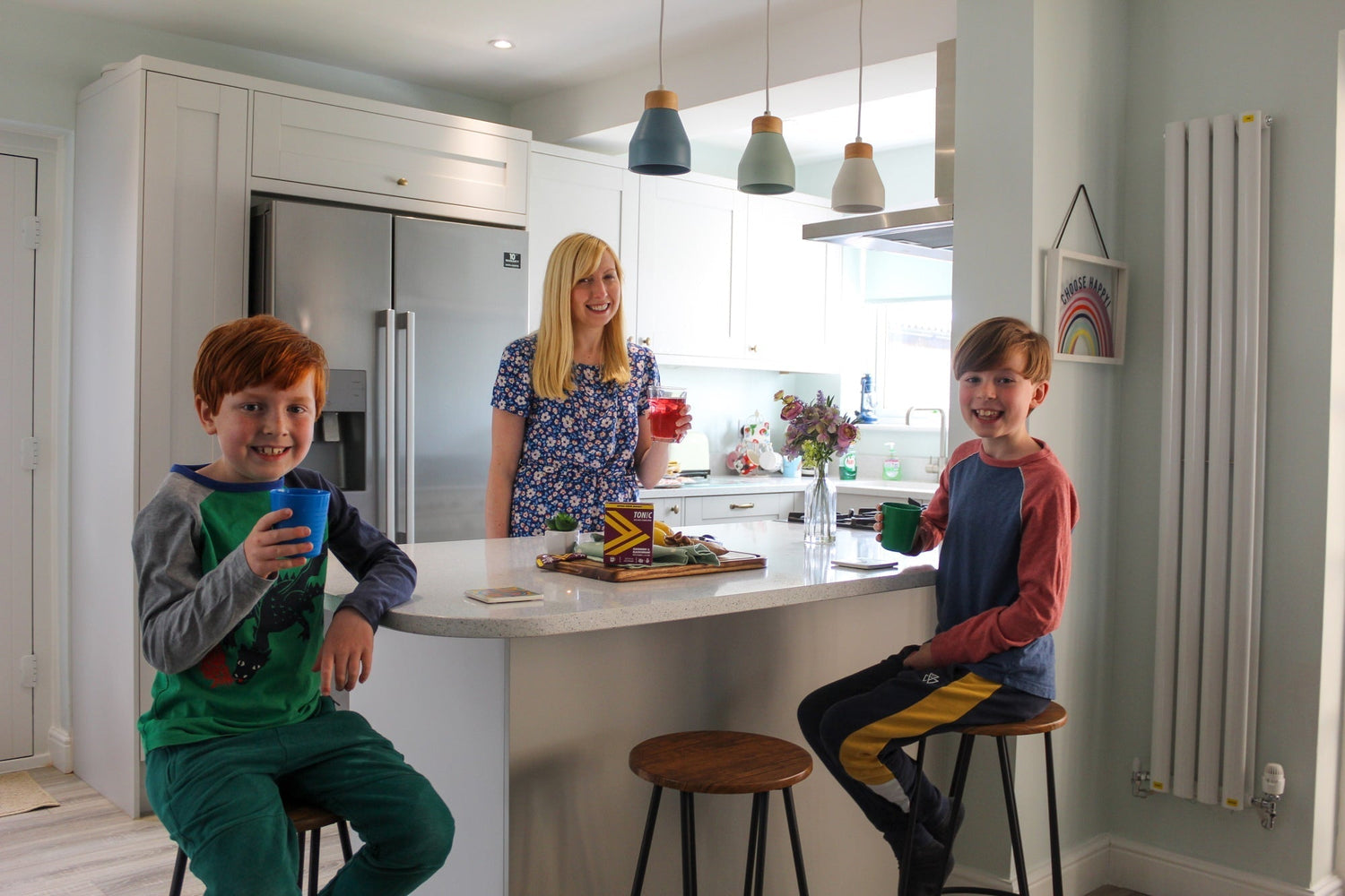 Rowene and her boys drinking Tonic