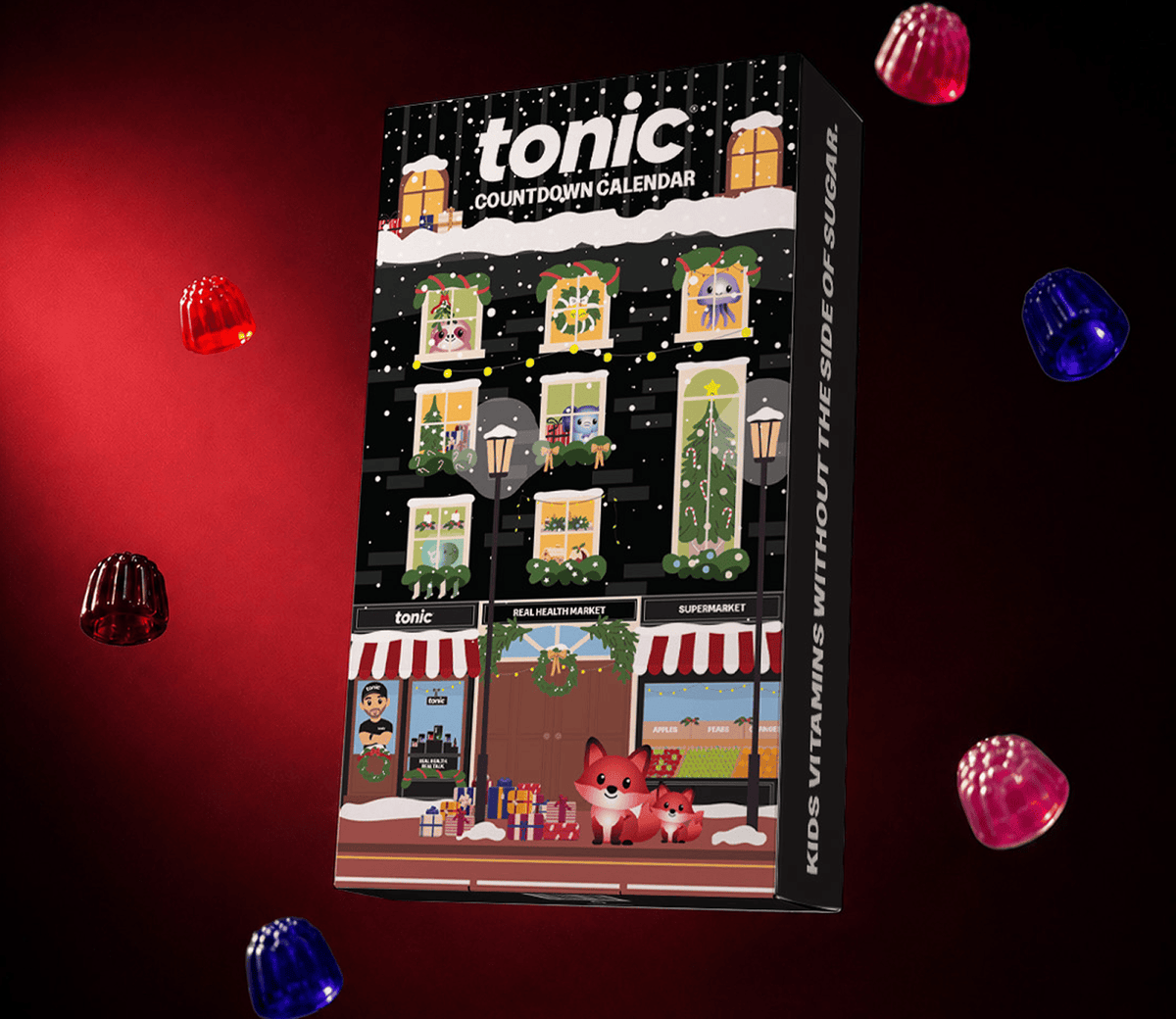 A boxed Tonic Countdown Calendar product shown upright against a dark red and black background, surrounded by floating gummies. The package features illustrated holiday storefront windows, snow, a fox, and the Tonic brand name at the top.