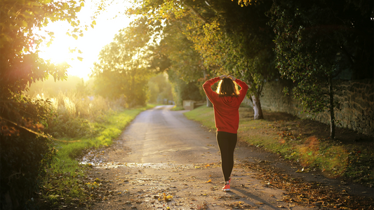 Woman walking in the sun