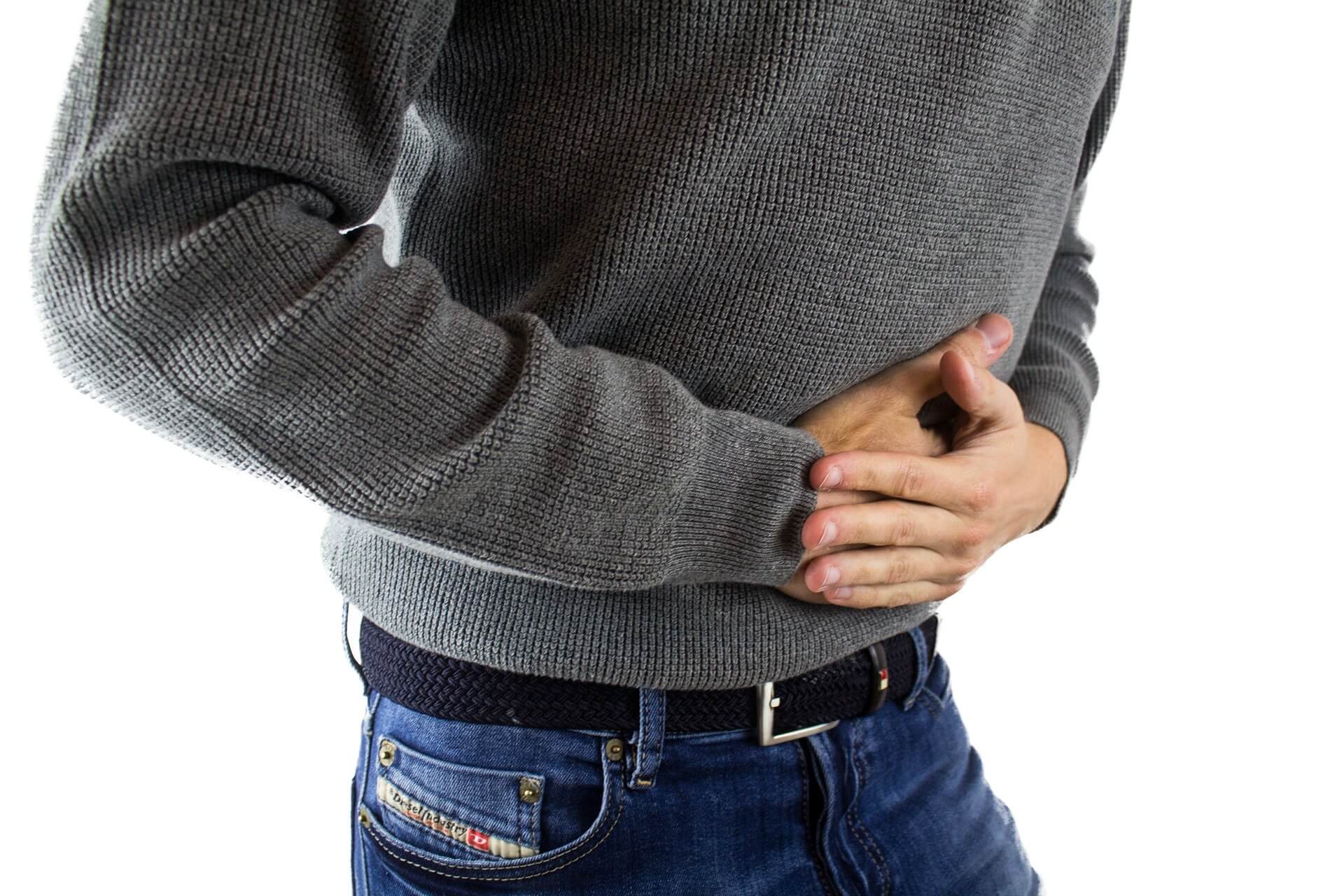 A man suffering from stomach upset