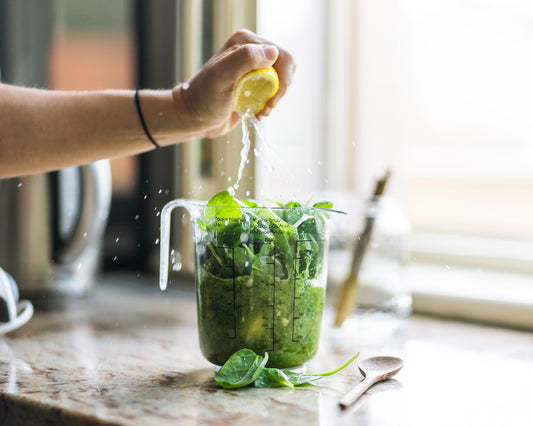 Lemon squeezed into drink