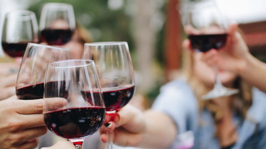 people drinking red wine with antioxidants