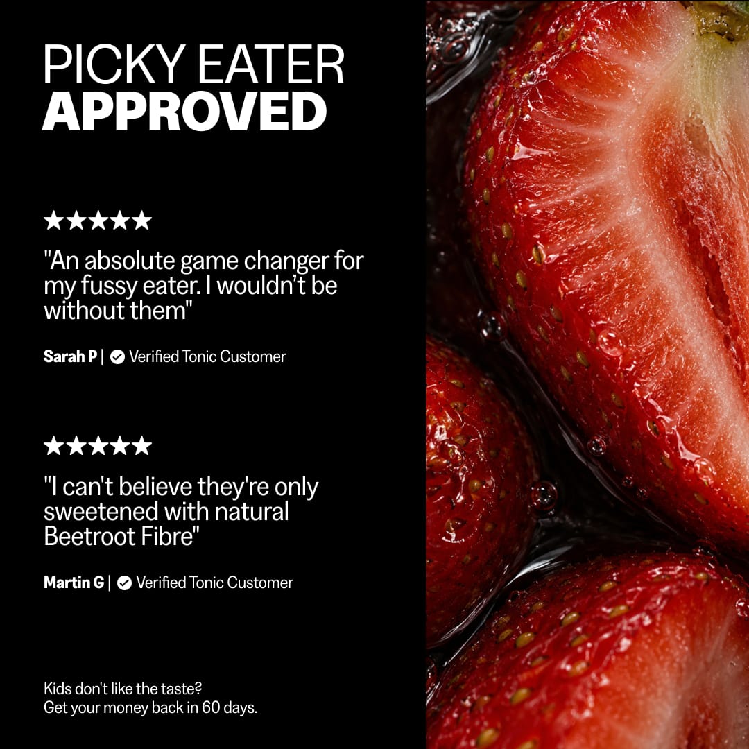 Five-star parent reviews of Tonic Kids Multi Gummies praising them for fussy eaters and natural beetroot fibre sweetness, beside fresh strawberries. 60-day money-back taste guarantee